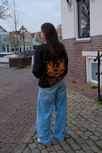 ORANGE LONGSLEEVE BLACK